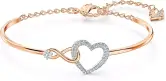 "Pulsera Swarovski Swa con Baño Oro Rosa, Símbolo Corazón e Infinito y Cristales Blancos"