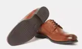 Zapato de piel marrón con cordones