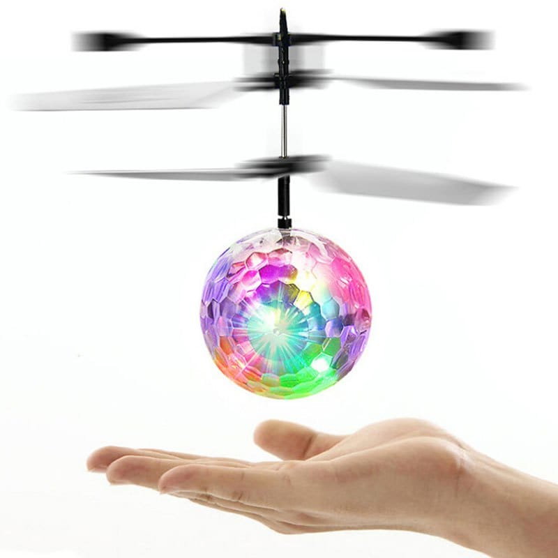 Juguete colorido mágico del helicóptero de la inducción de la bola de destello del LED